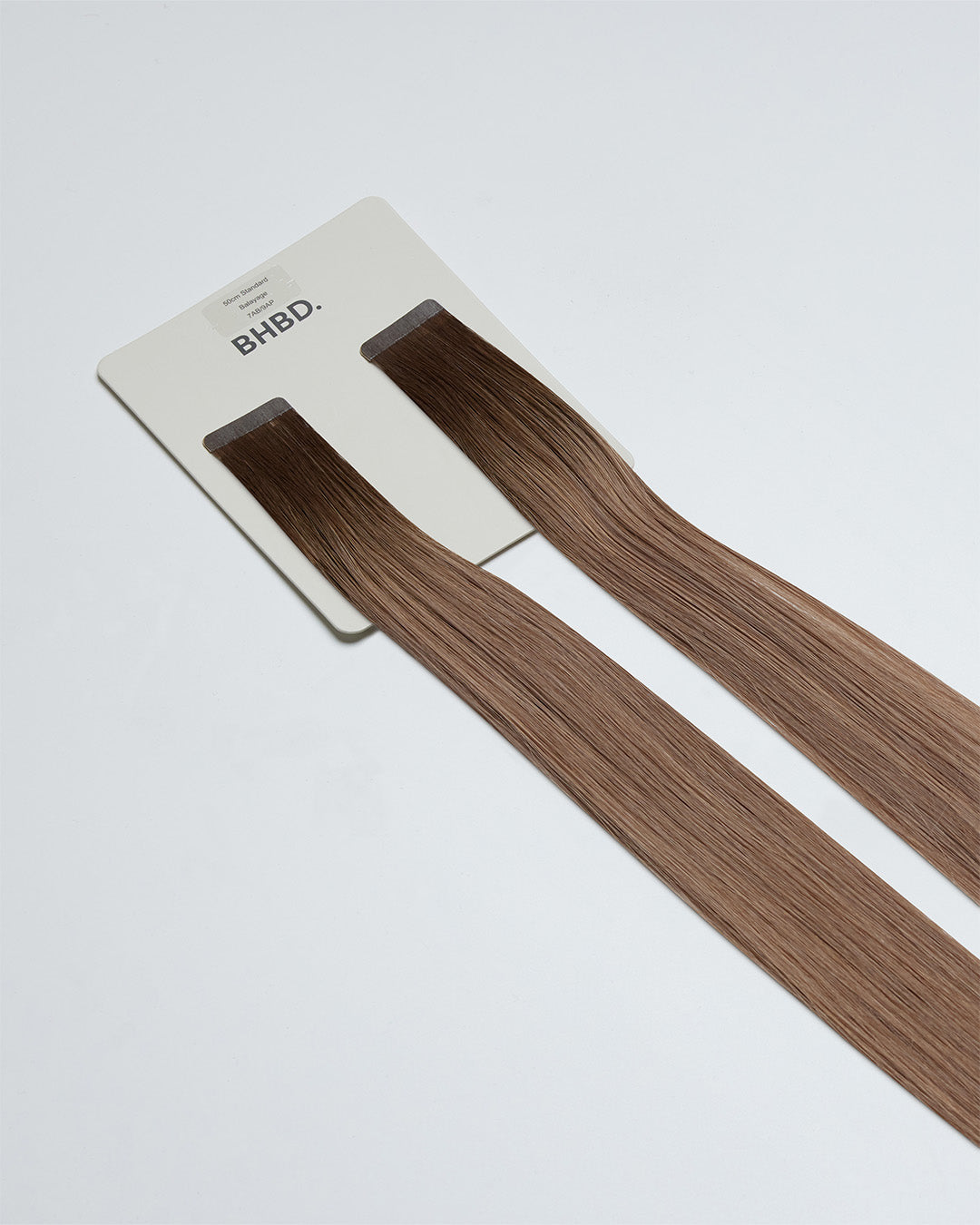 BHBD tape extensions. Color 7AB/9AP balayage.